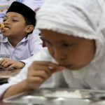 Ilustrasi pelaksanaan program Makan Bergizi Gratis (MBG) untuk anak sekolah di Indonesia