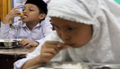 Ilustrasi pelaksanaan program Makan Bergizi Gratis (MBG) untuk anak sekolah di Indonesia