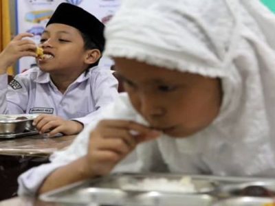 Ilustrasi pelaksanaan program Makan Bergizi Gratis (MBG) untuk anak sekolah di Indonesia